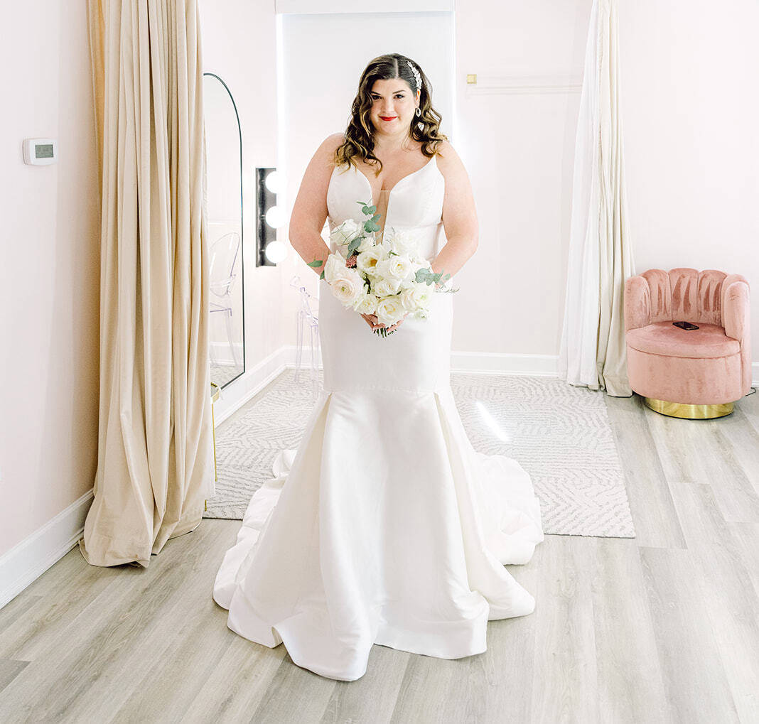 Photo of Model wearing a The Bridal Room Plus Size Collection Gown